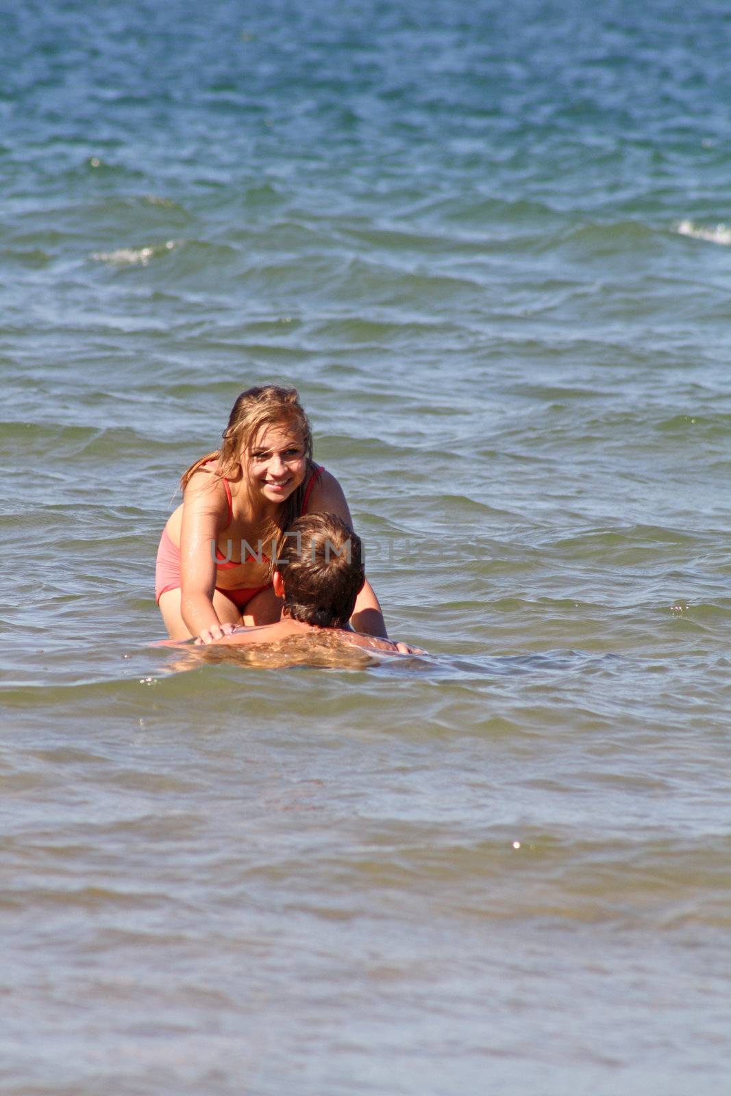 teenager in the sea at cromer england