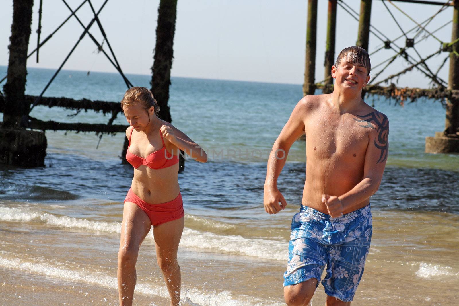 teenagers having fun in the sea