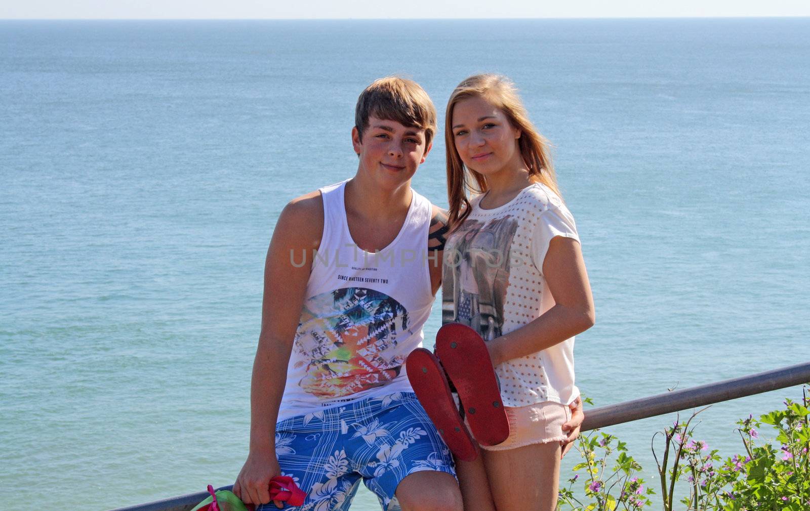 teenagers in love at the beach