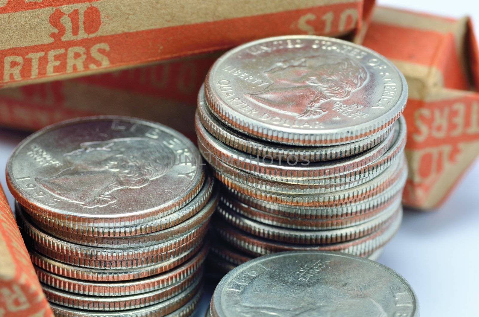 Macro closeup of a stack of quarters.