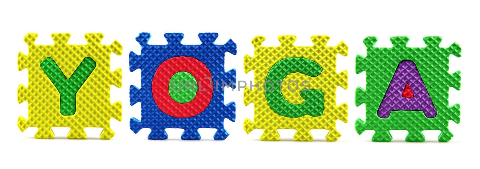 Alphabet puzzle pieces on white background