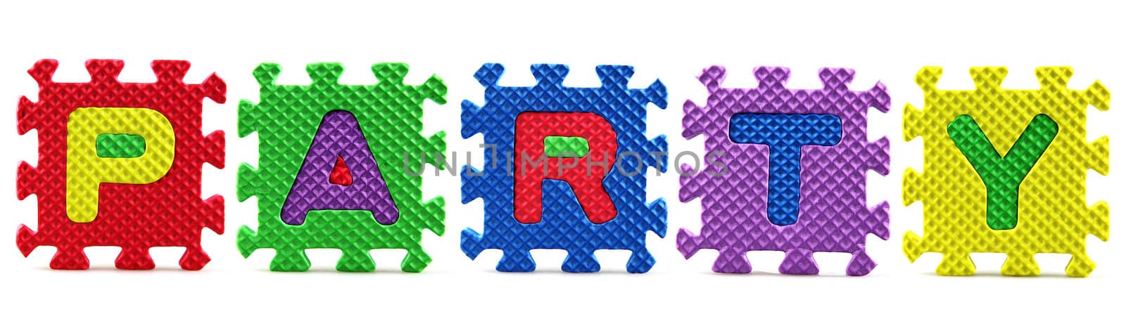 Alphabet puzzle pieces on white background