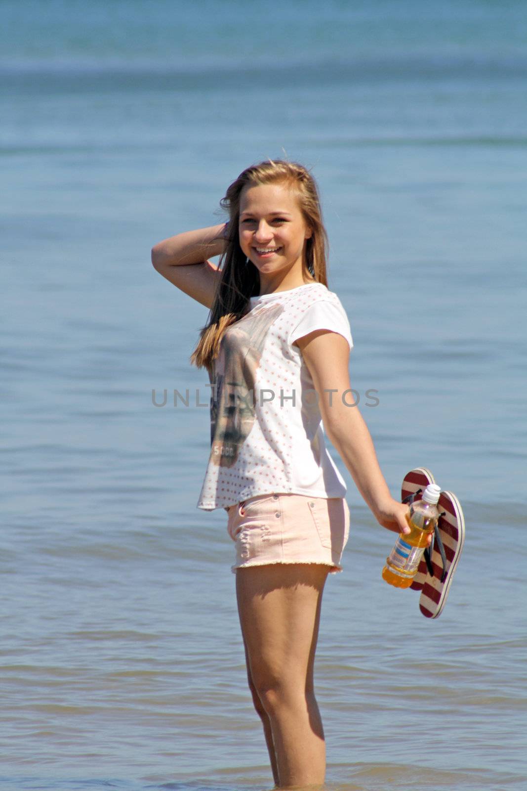 stunning teenage girl on the beach 