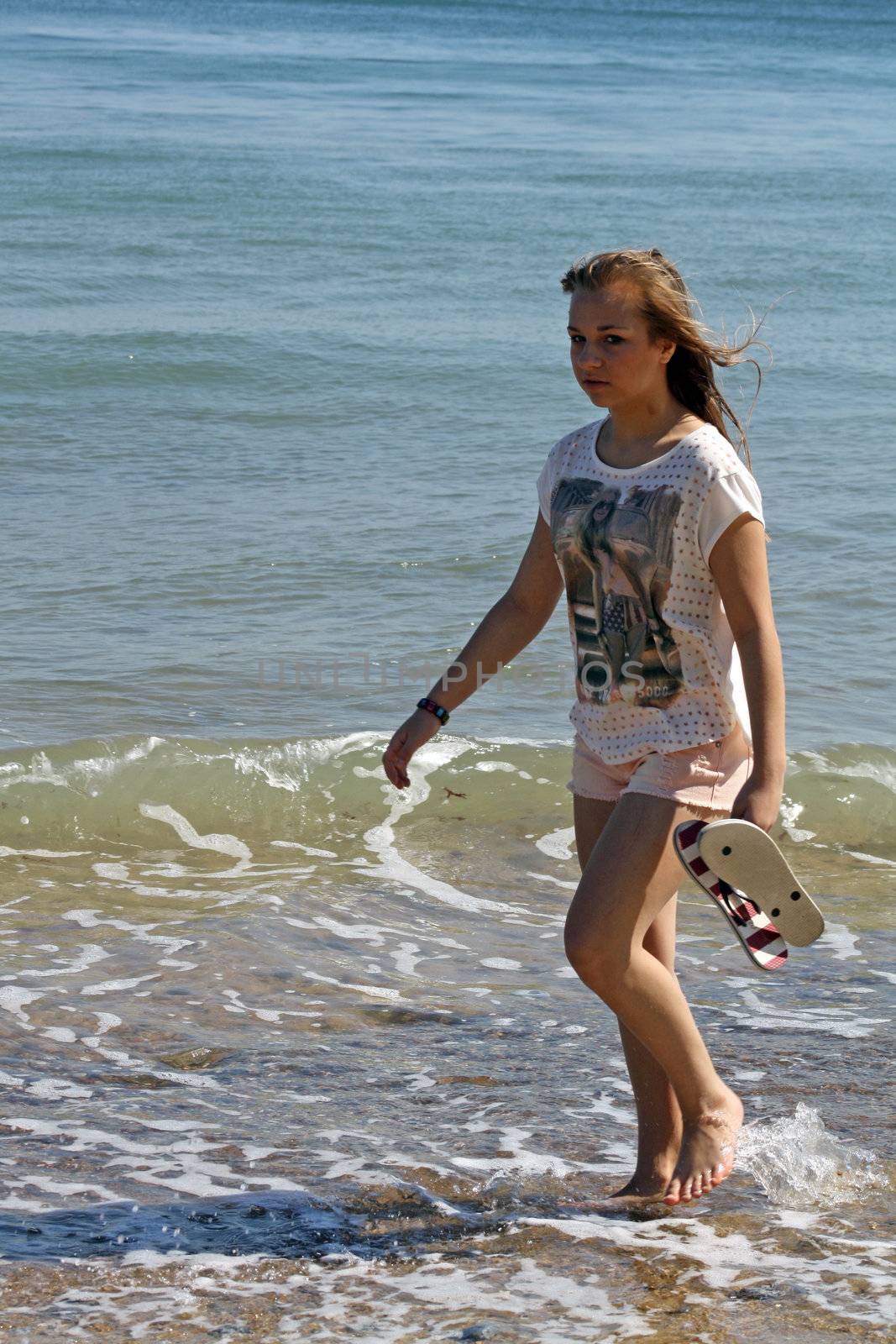 stunning teenage girl on the beach