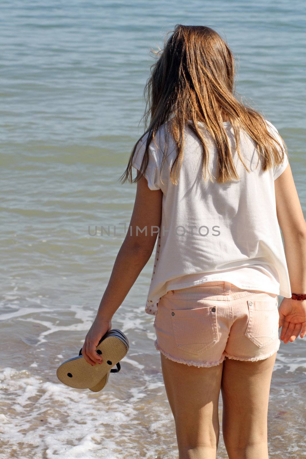 stunning teenage girl on the beach