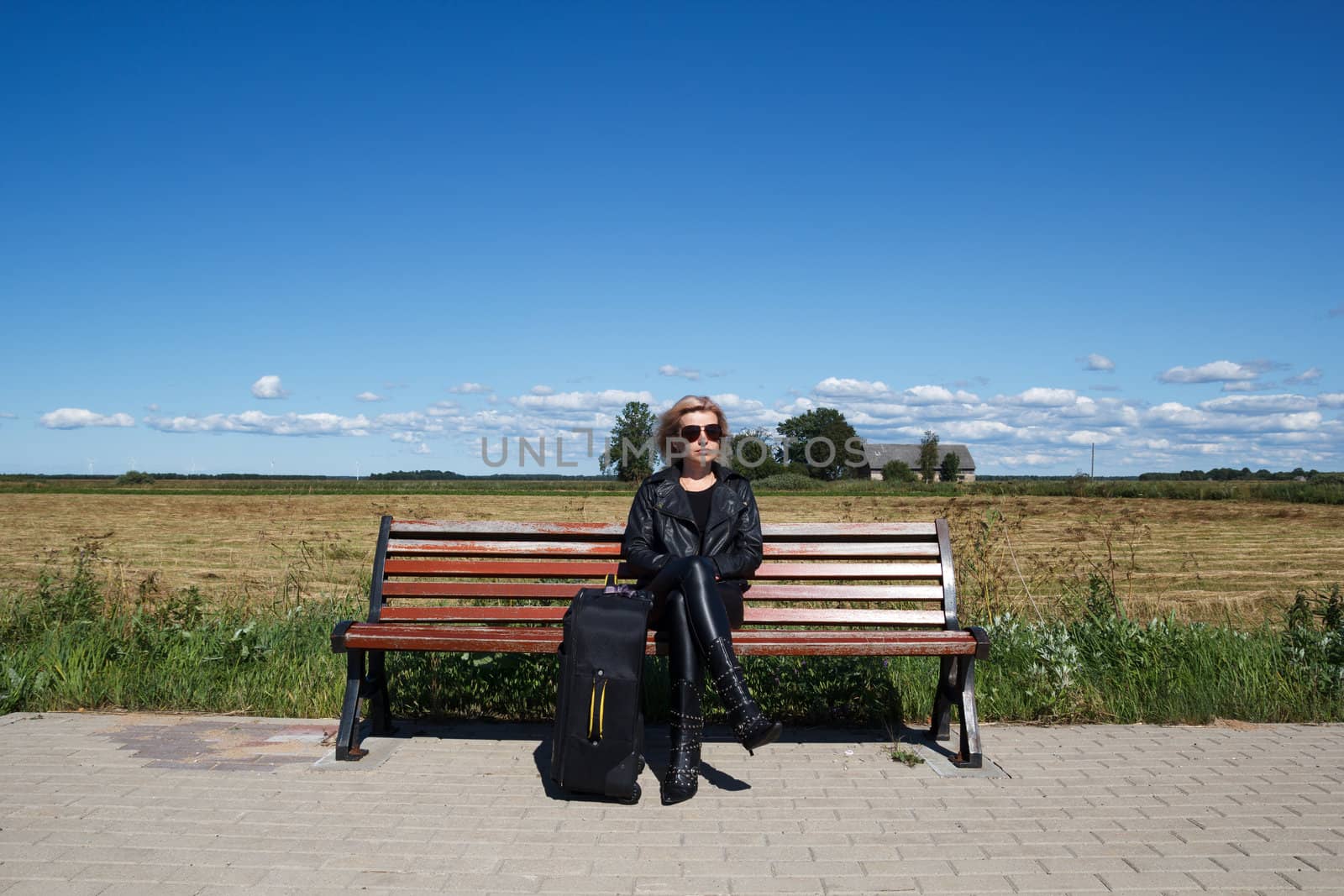 bus stop bench in the countryside by AigarsR