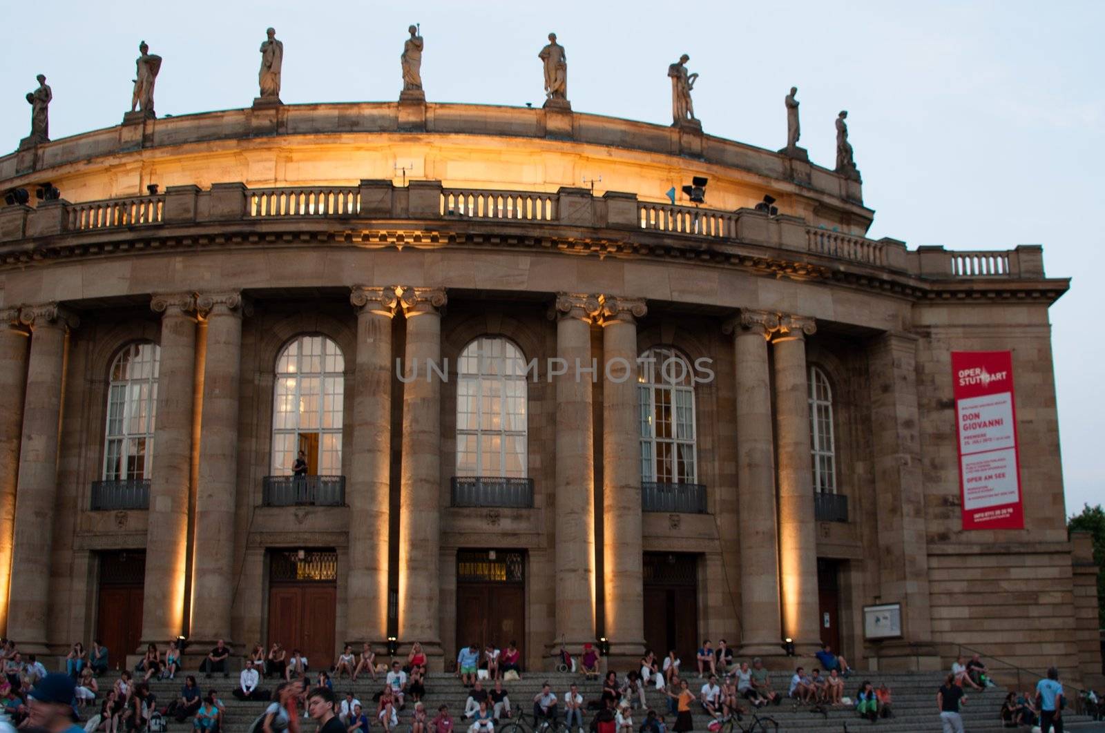STUTTGART, GERMANY - JULY 25: More than 5.000 people are watching the public viewing of the premiere of Mozart´s opera “Don Giovanni” on a large screen in front of the Opera building in Stuttgart, Germany on July 25, 2012.