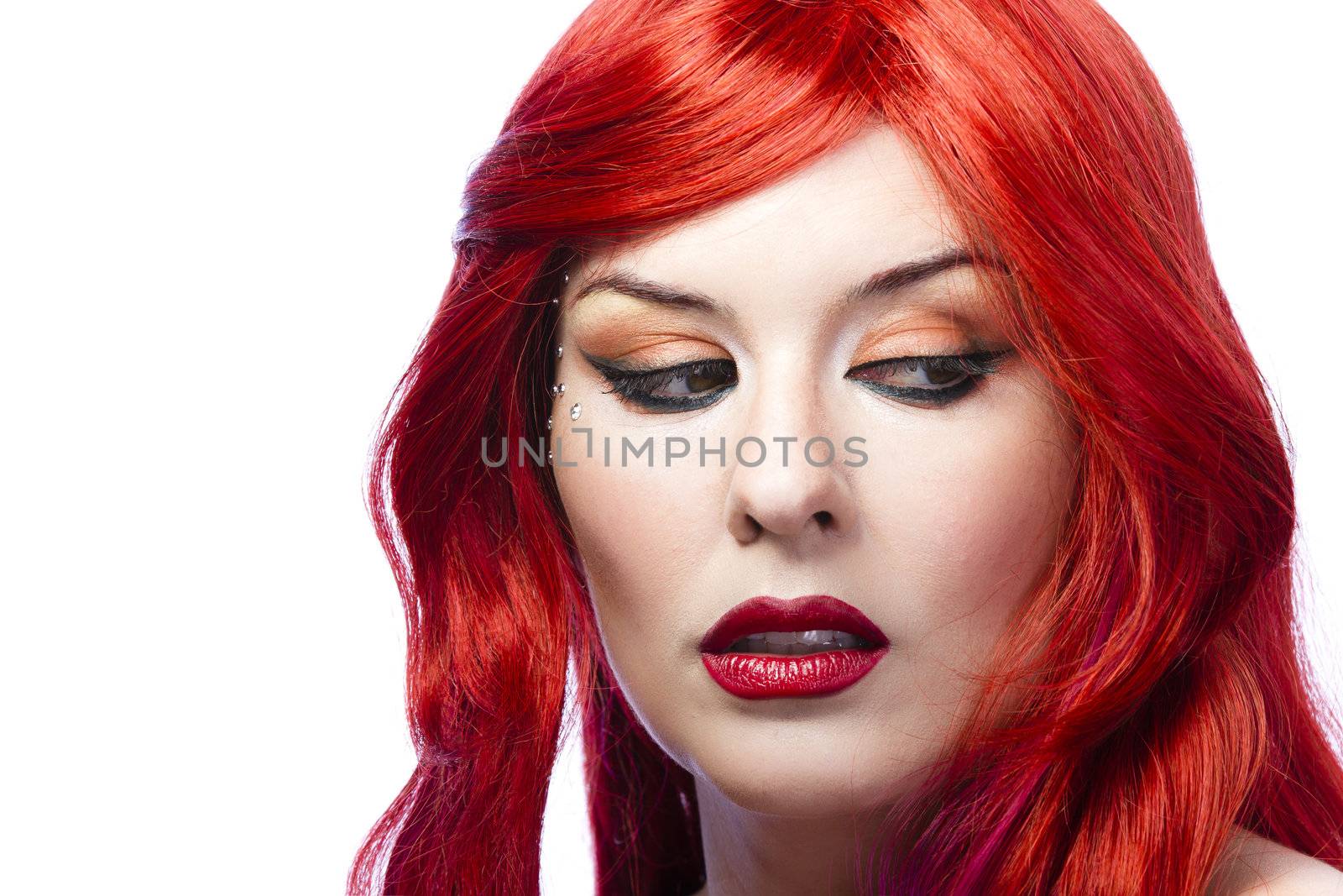 Face of a beautiful young woman with bright makeup by FernandoCortes