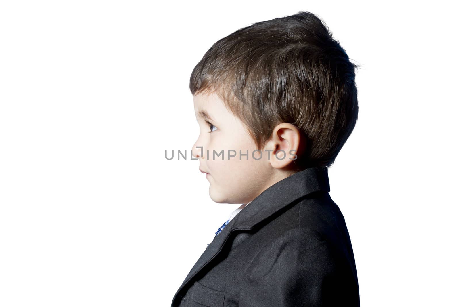 Child dressed in suit and tie
