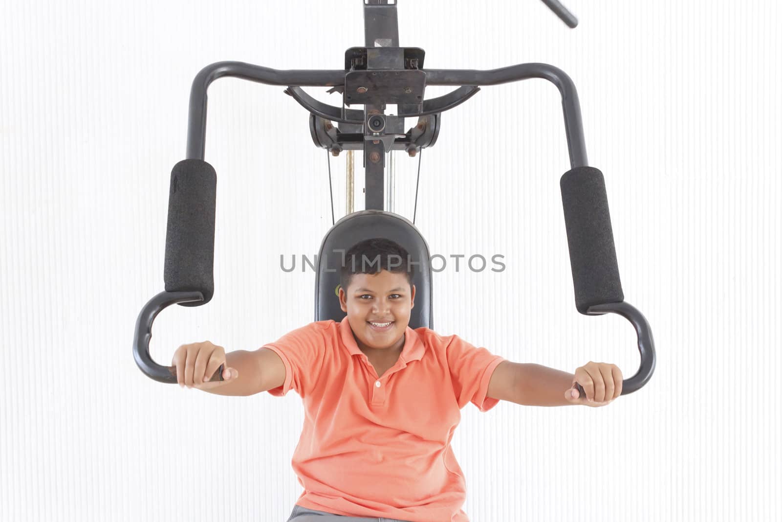 Thai boy lifting weights