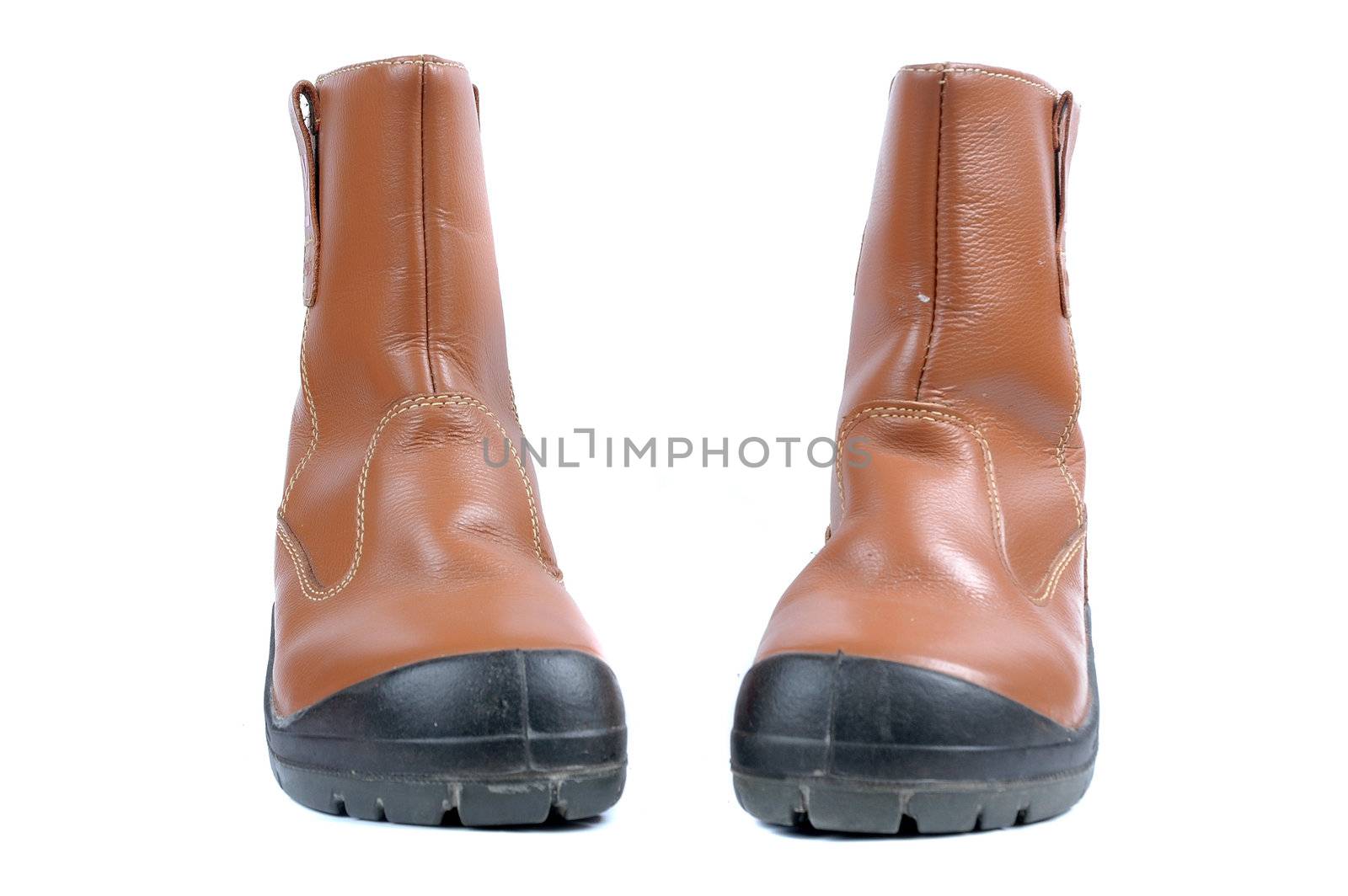 a pair of brown leather boots by antonihalim