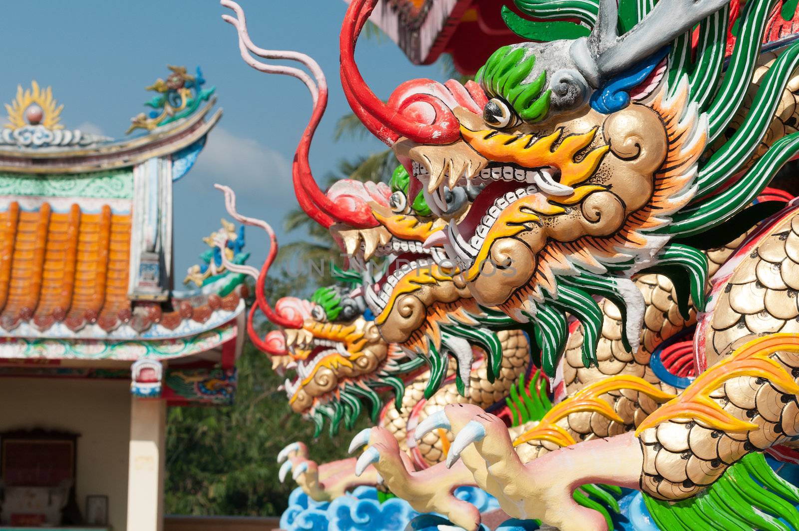 Chinese style dragon statue on the front of chinese temple