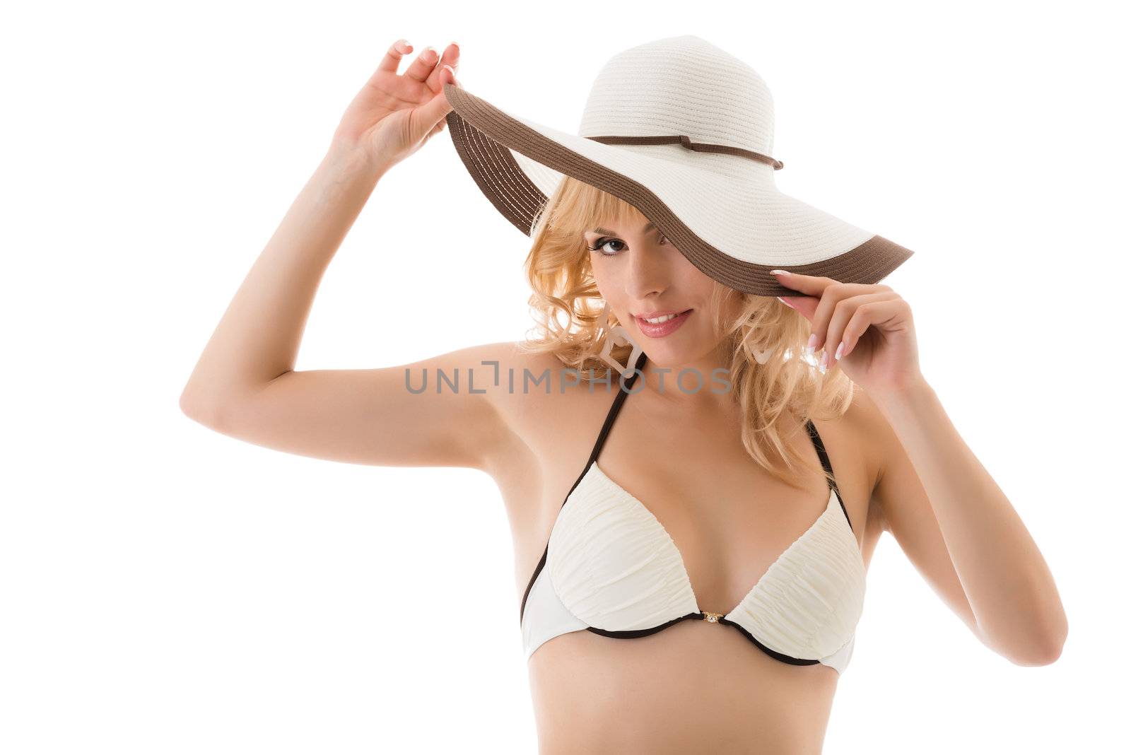 Playful nice blonde girl in bikini and hat isolated on white background