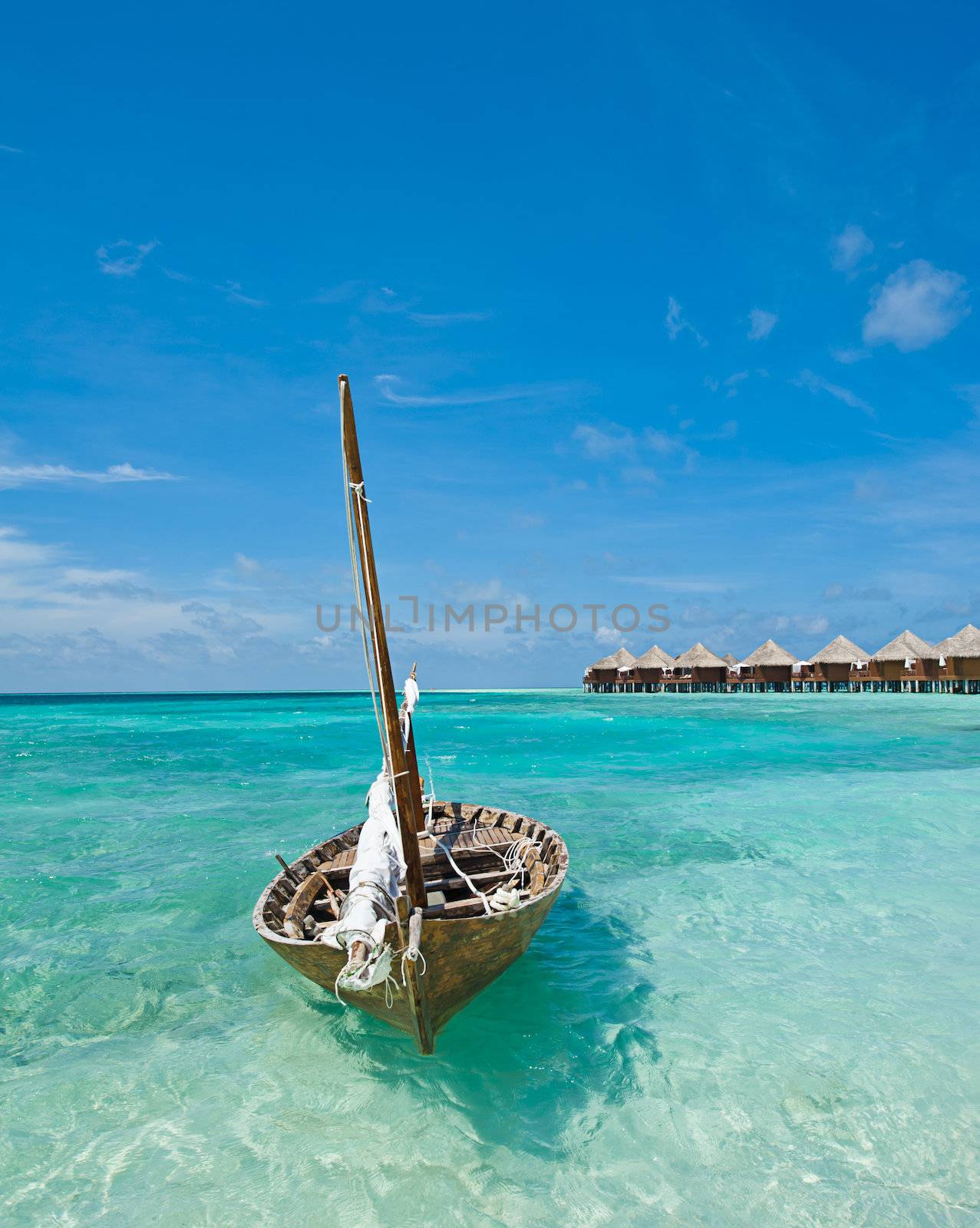 Small ship on the tropical coast in the Maldives