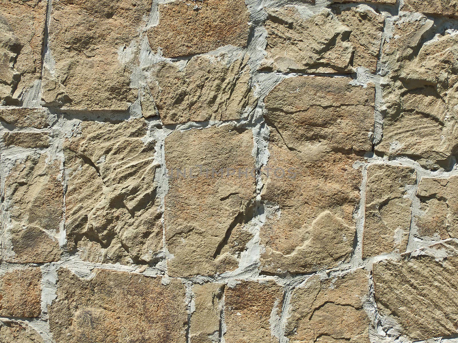 Background and texture from a wall trimmed with a stone