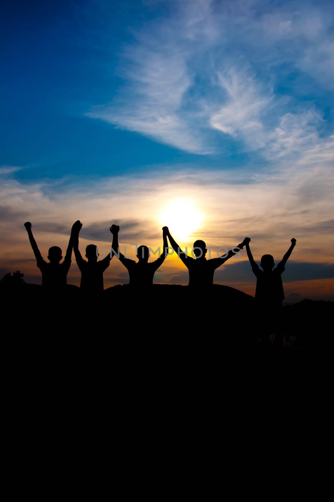 silhouette of boy happy and victory  together