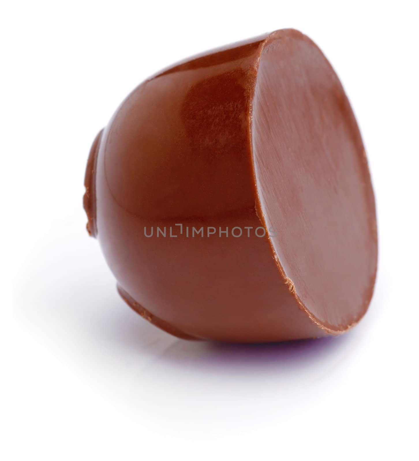 Chocolate sweet isolated on a white background. Overturned.