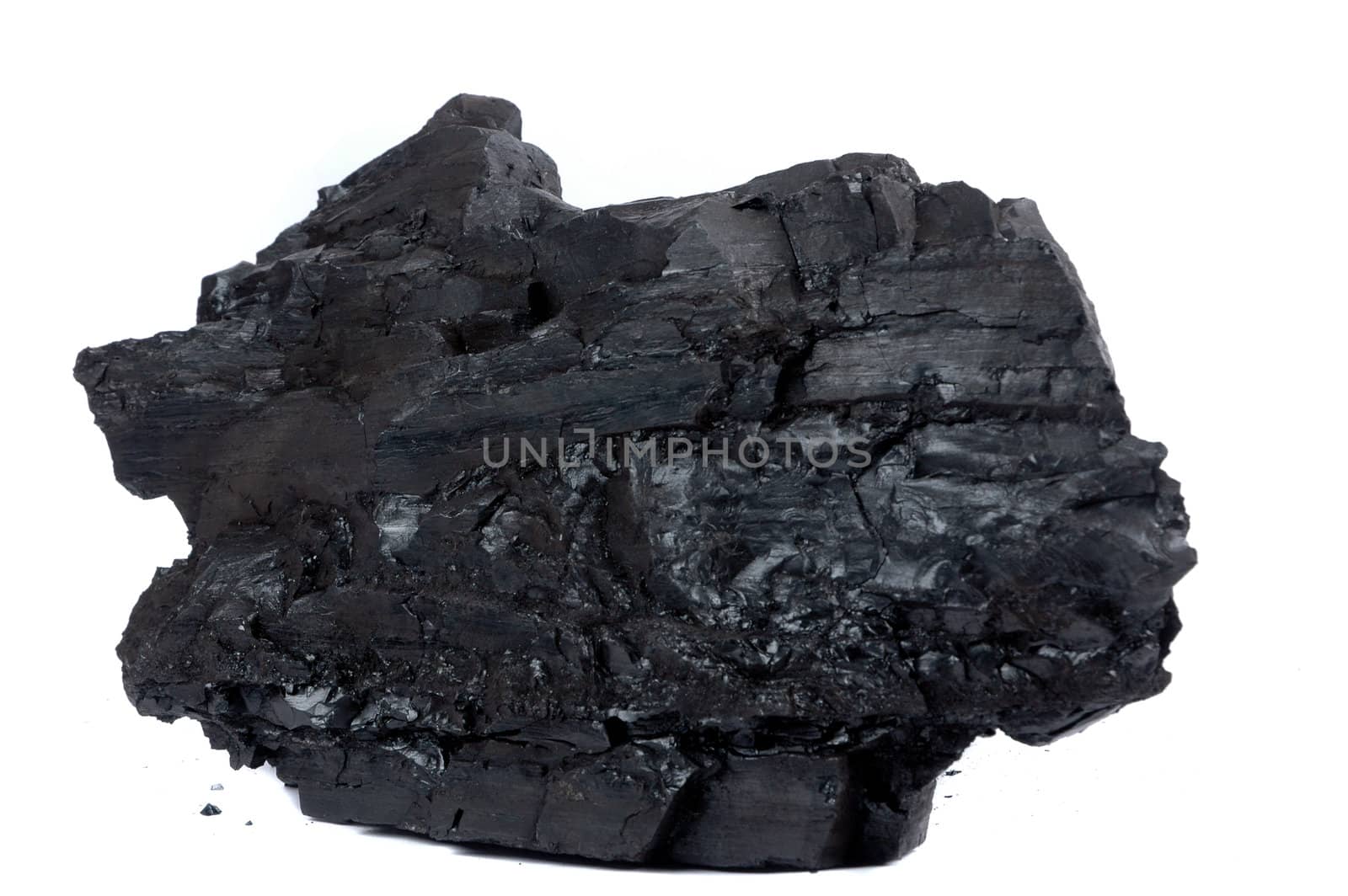 a big lump of coal isolated on white background