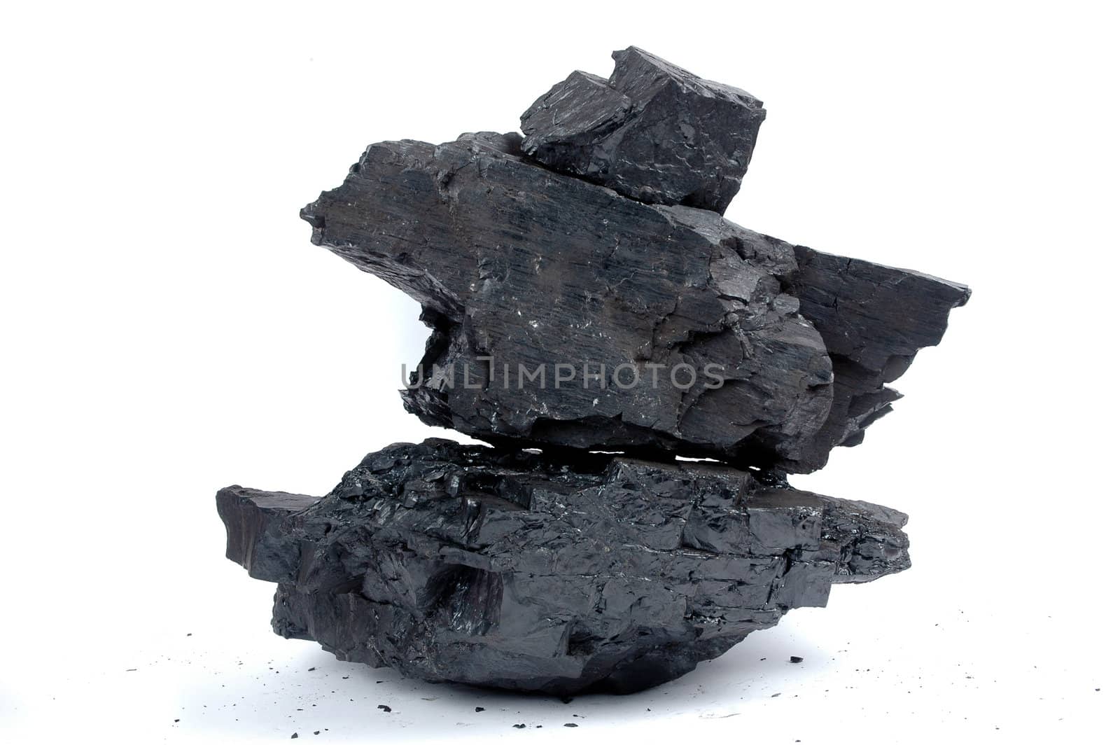 pile lumps of coals by antonihalim