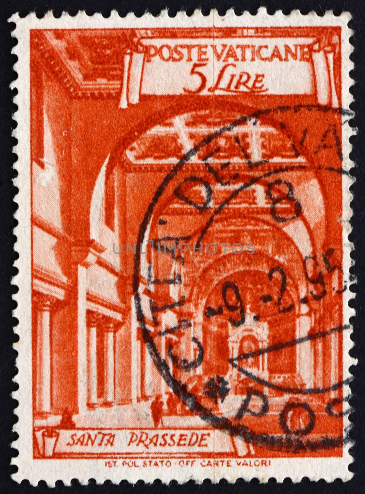 VATICAN - CIRCA 1949: a stamp printed in the Vatican shows Basilica St. Prassede, Minor Basilica in Rome, circa 1949