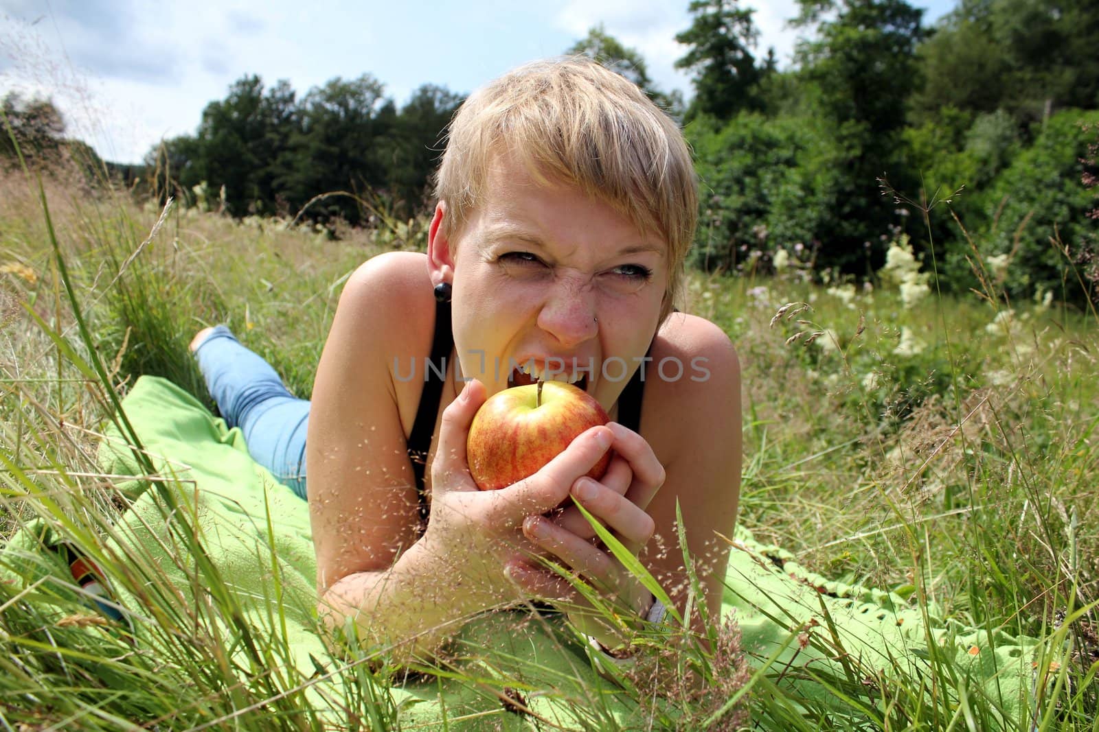 girl with apple on summer meadow by Teka77