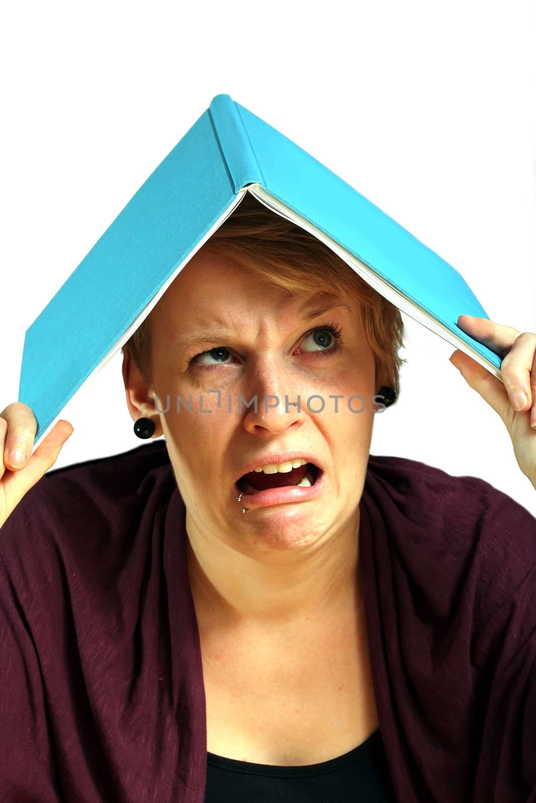 girl with book angry about learning