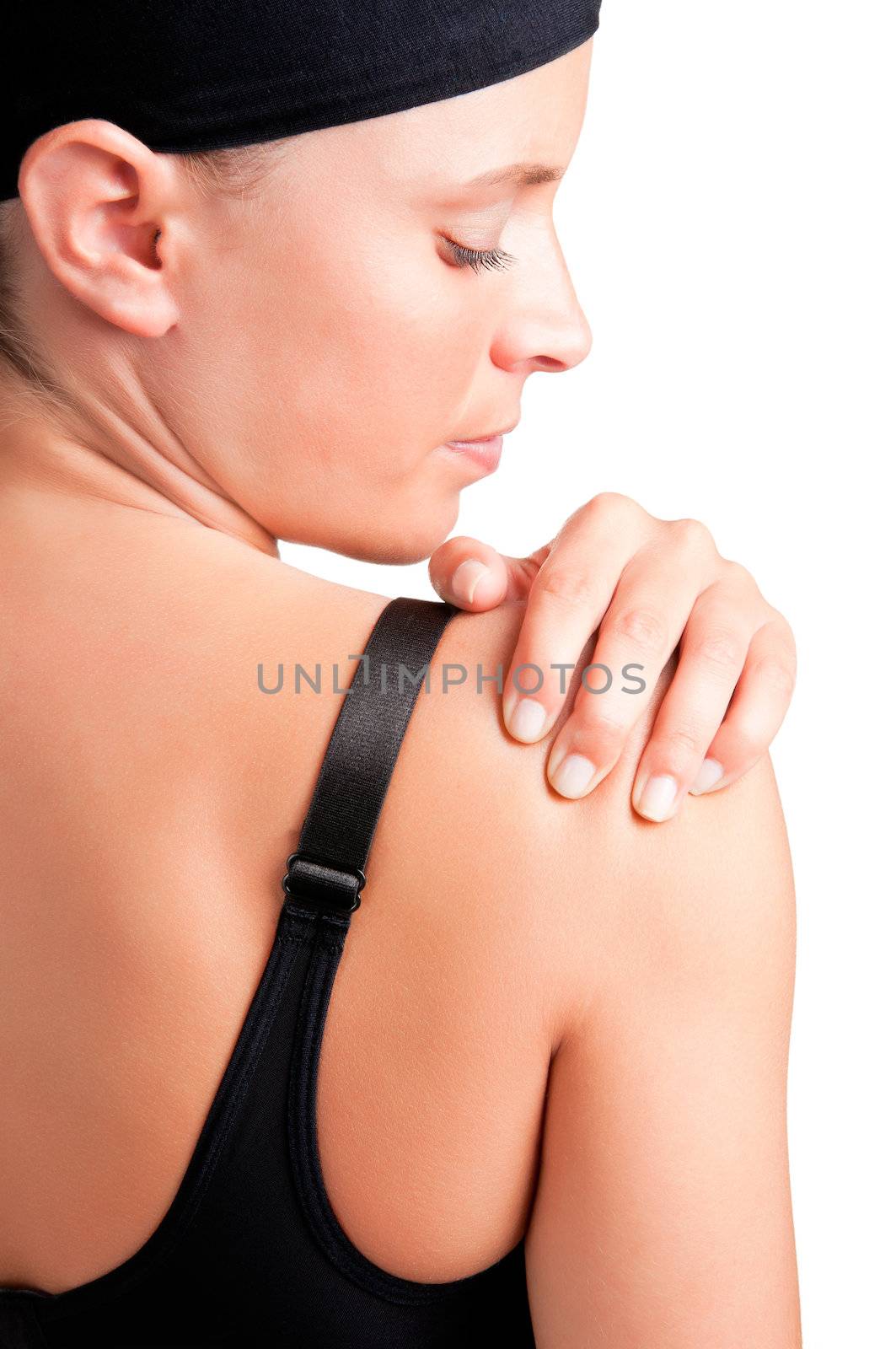 Young woman with pain in her shoulder