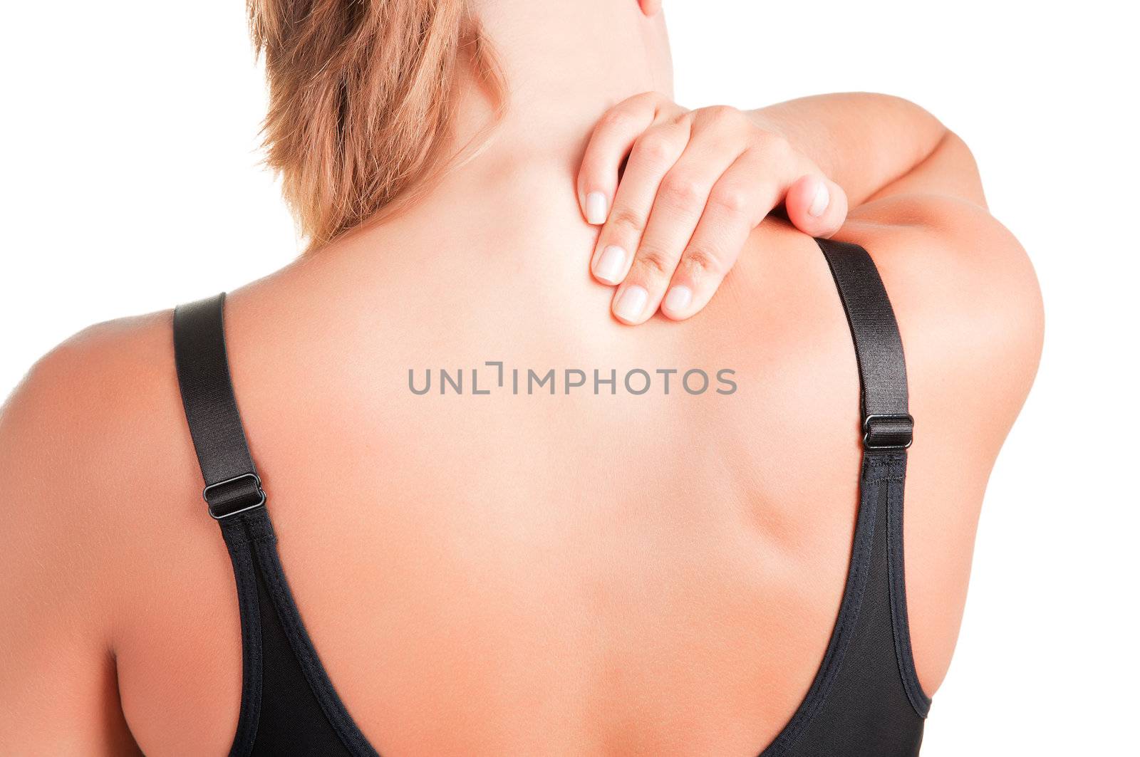 Young woman with pain in the back of her neck