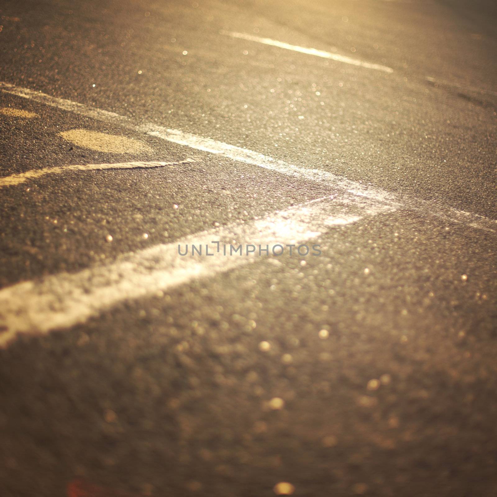 asphalt abstract background on sunrise