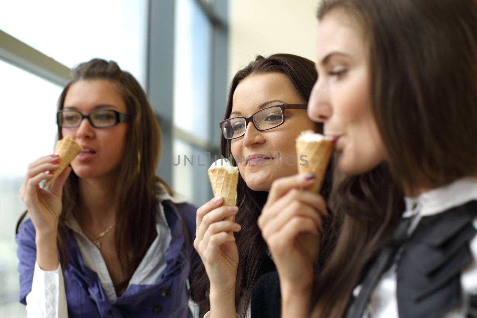 women licking ice cream  by Yellowj