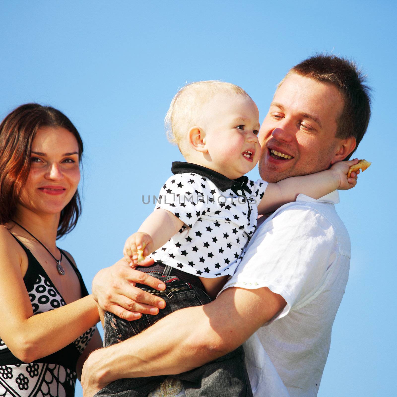 happy family blue sky on background