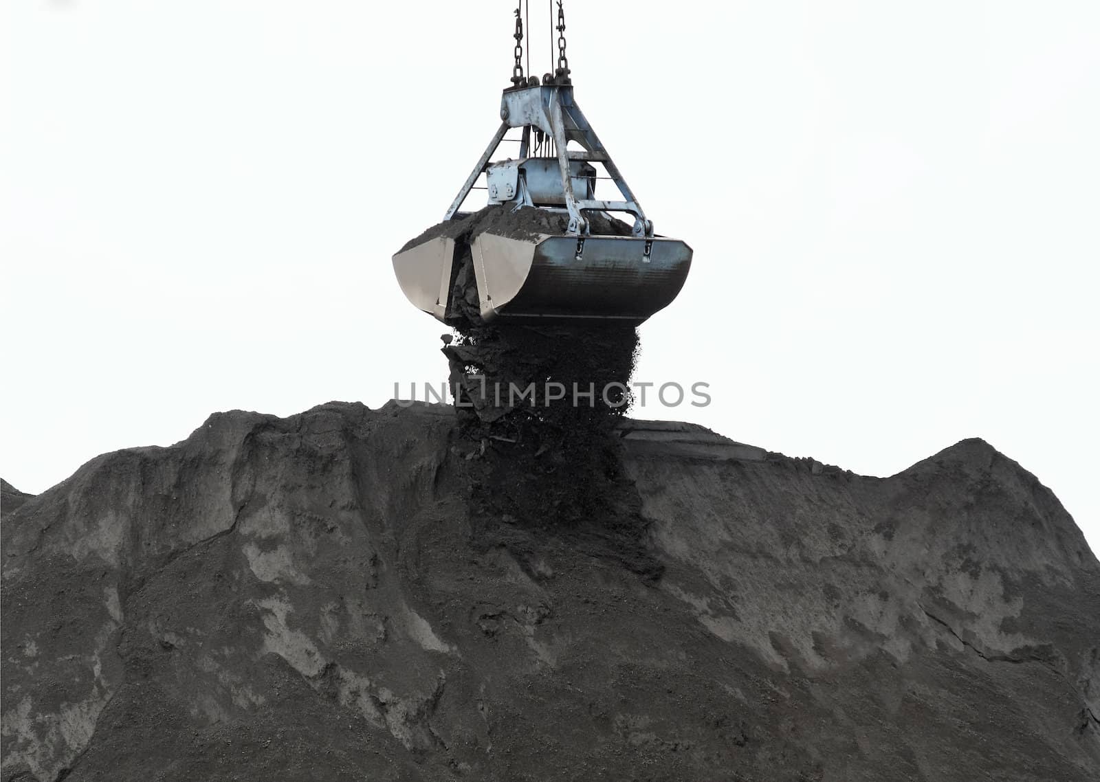 Stock of coal powder on white background.