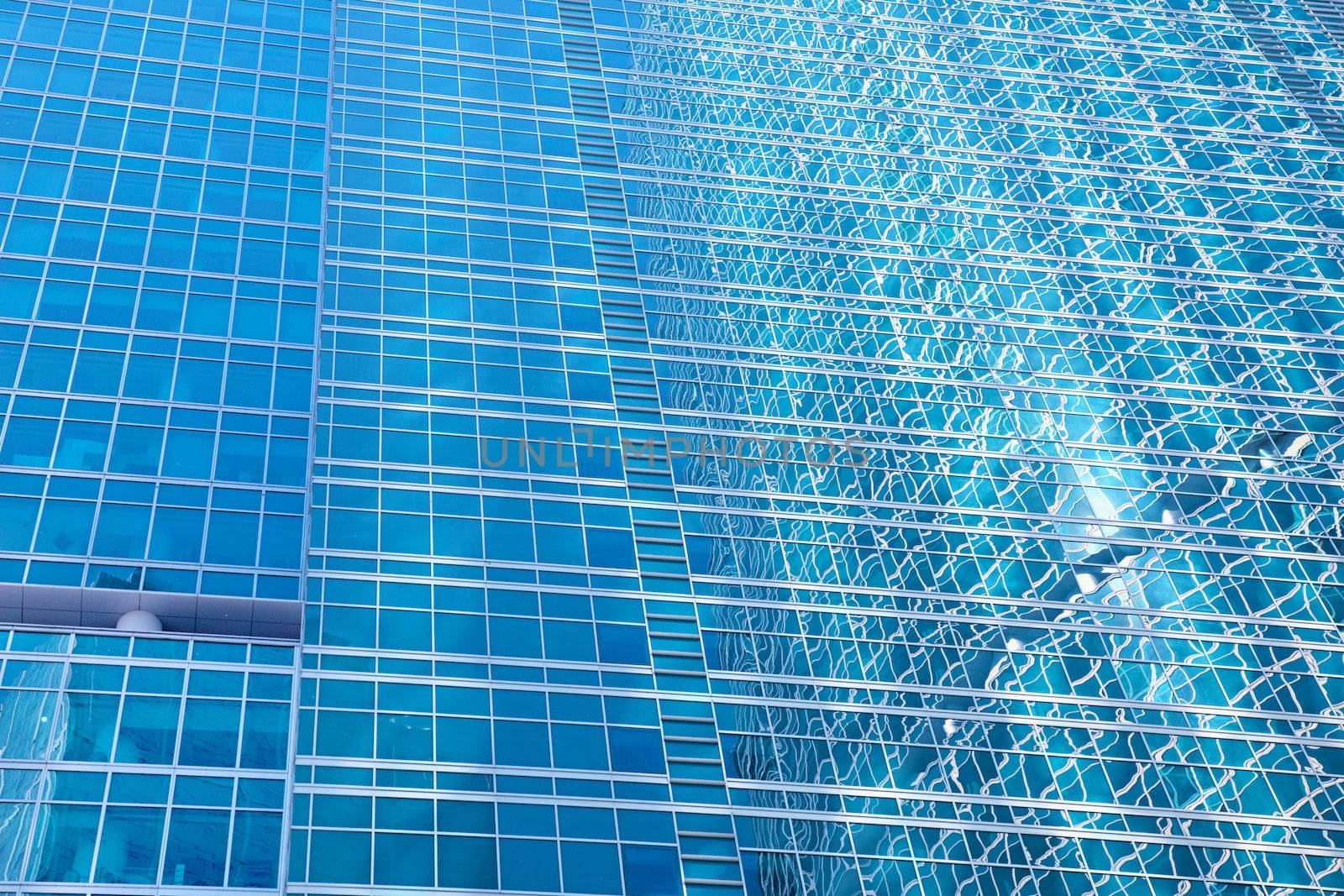 The walls and windows of a skyscraper - an abstract urban background