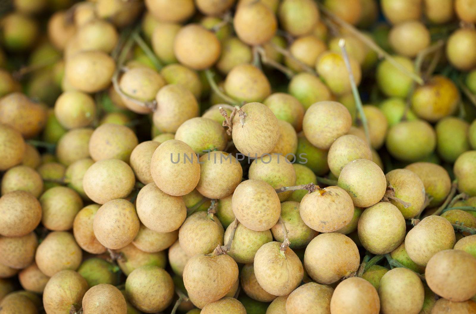 Longan fruit on the counter of the Asian market by pzaxe