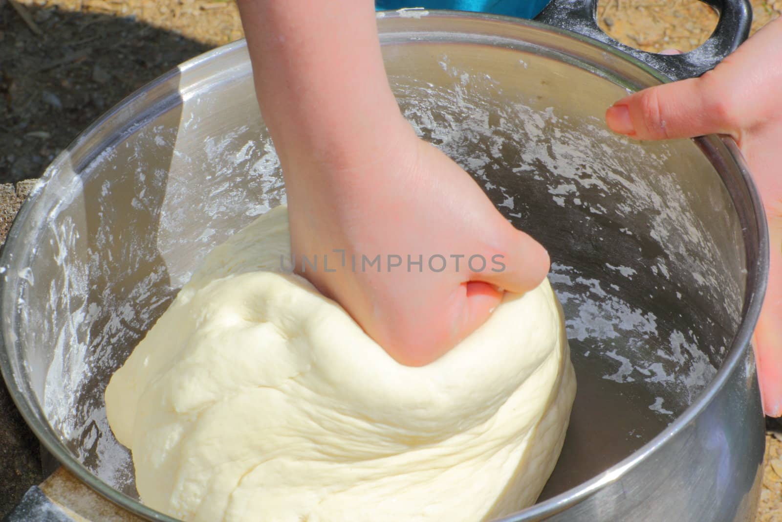 making dough outside for a homemade cake