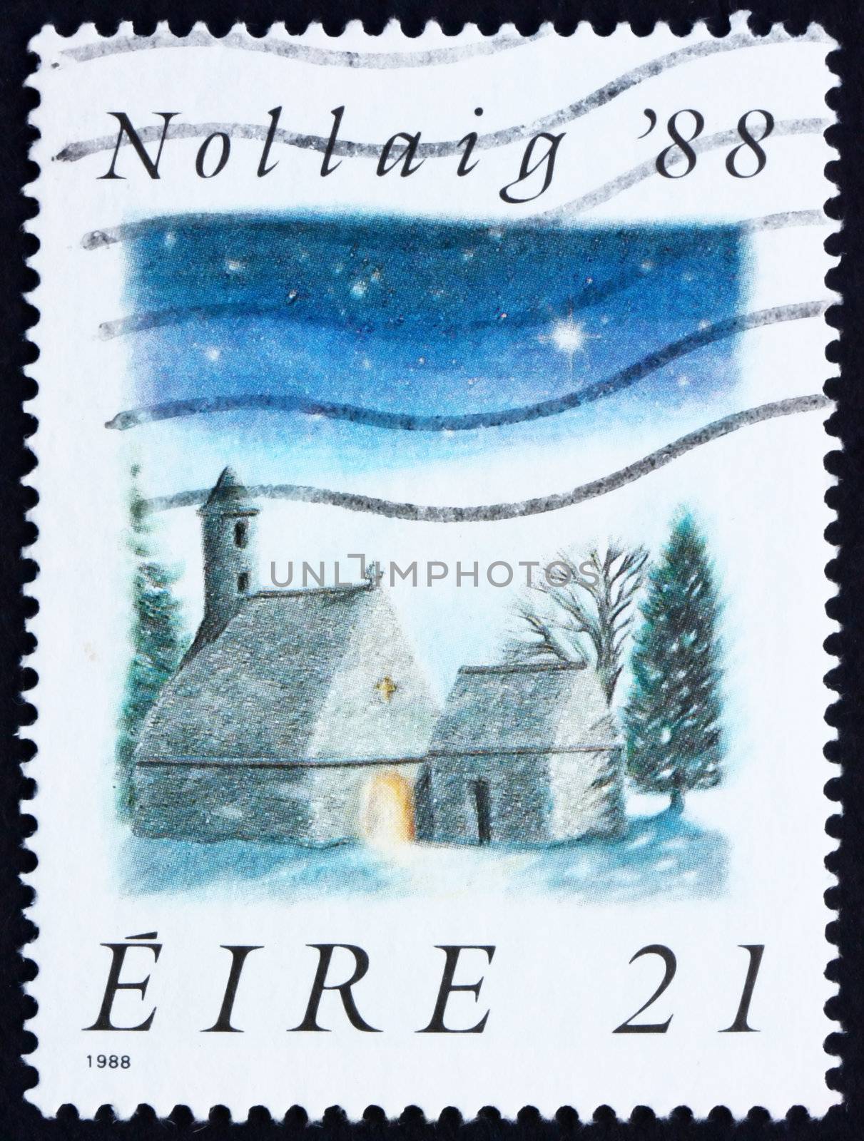 IRELAND - CIRCA 1988: a stamp printed in the Ireland shows St. Kevin's Church, Glendalough, Christmas, circa 1988