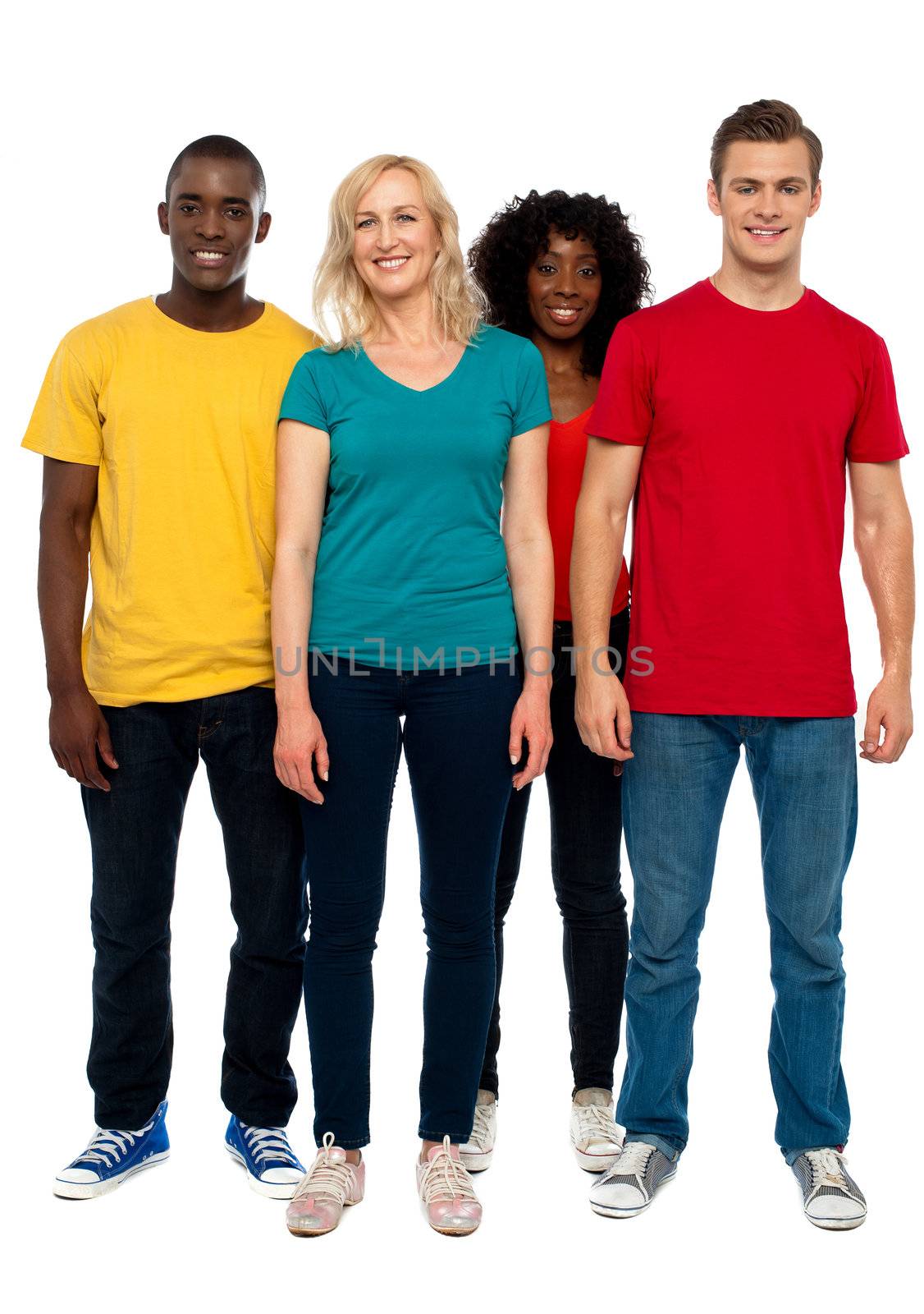 Full length portrait of causal young four friends by stockyimages