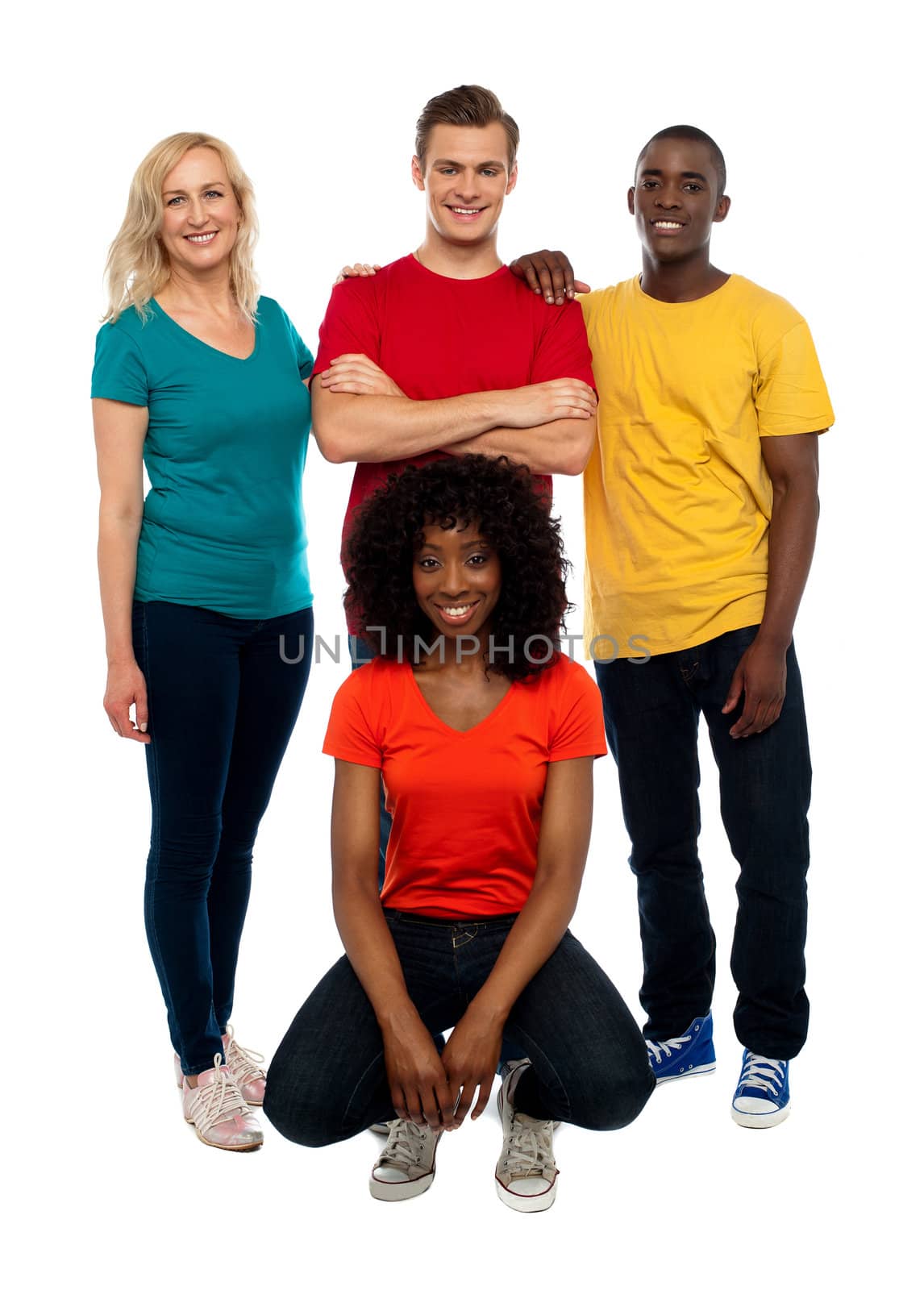 Isolated college mates posing against white background. Cheerful group