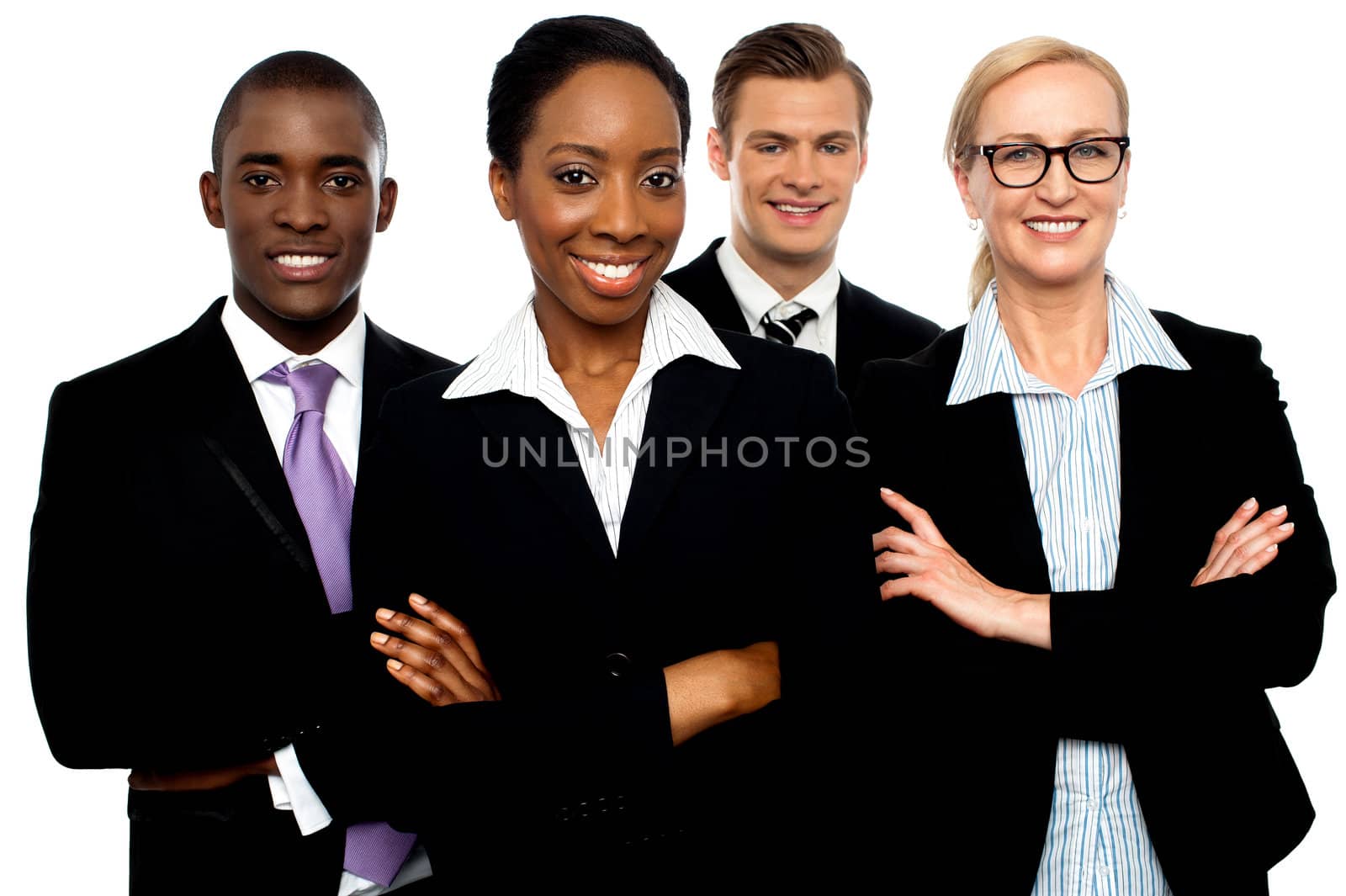 Portrait of team of business associates posing with arms crossed