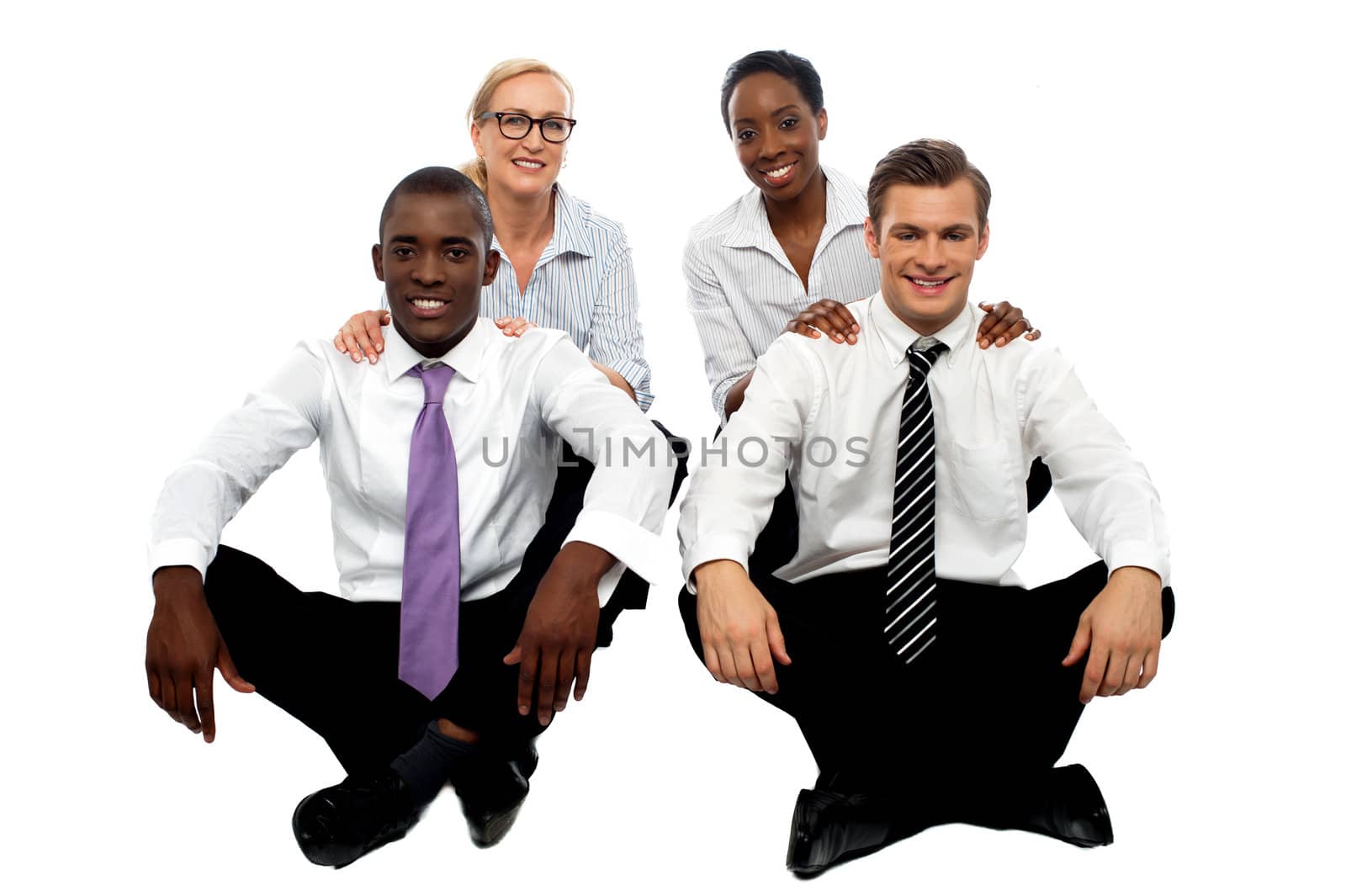 Business teams of two each. Healthy competition. Executives sitting on floor