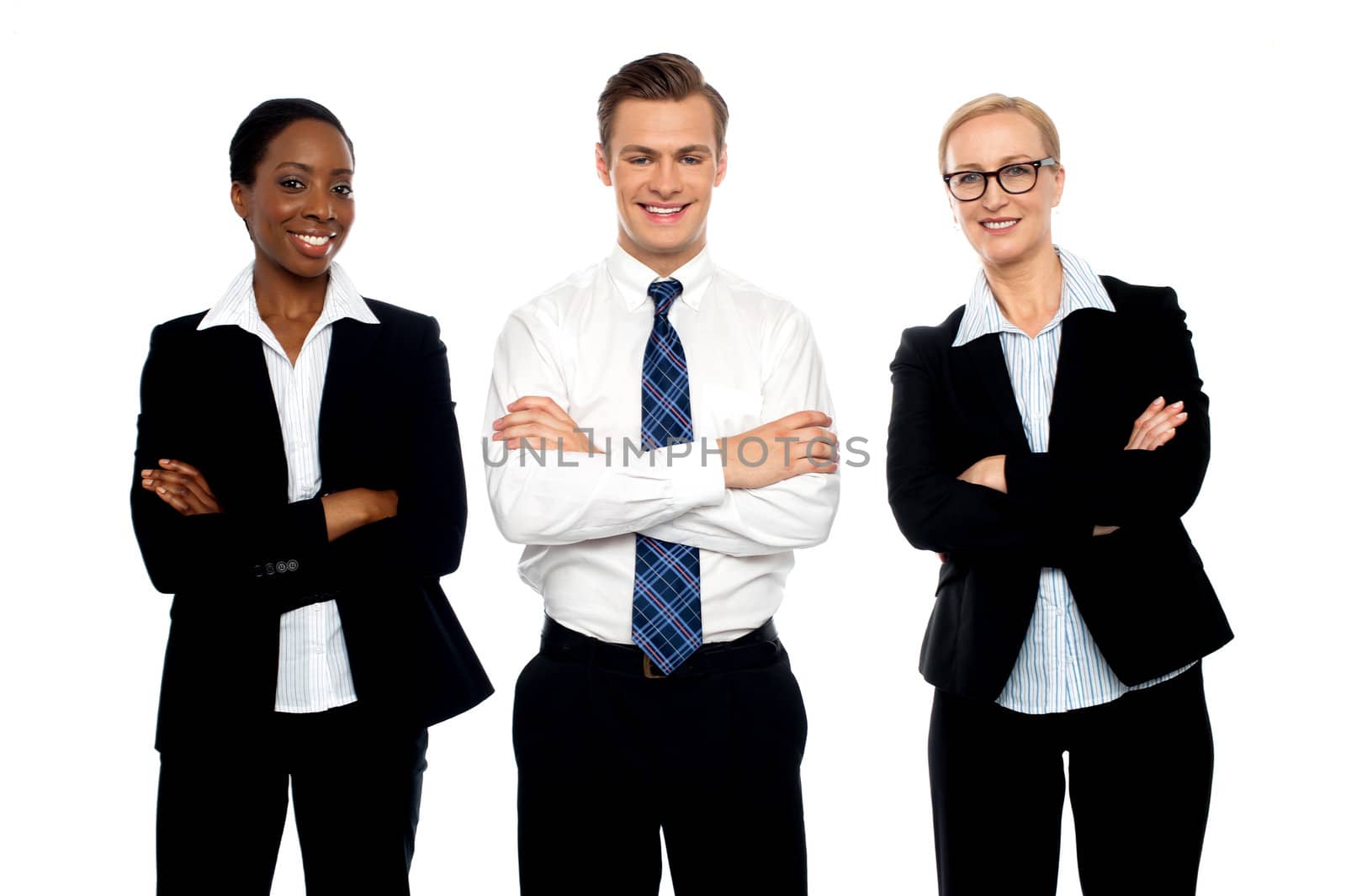 Successful happy business team posing with arms folded isolated on white