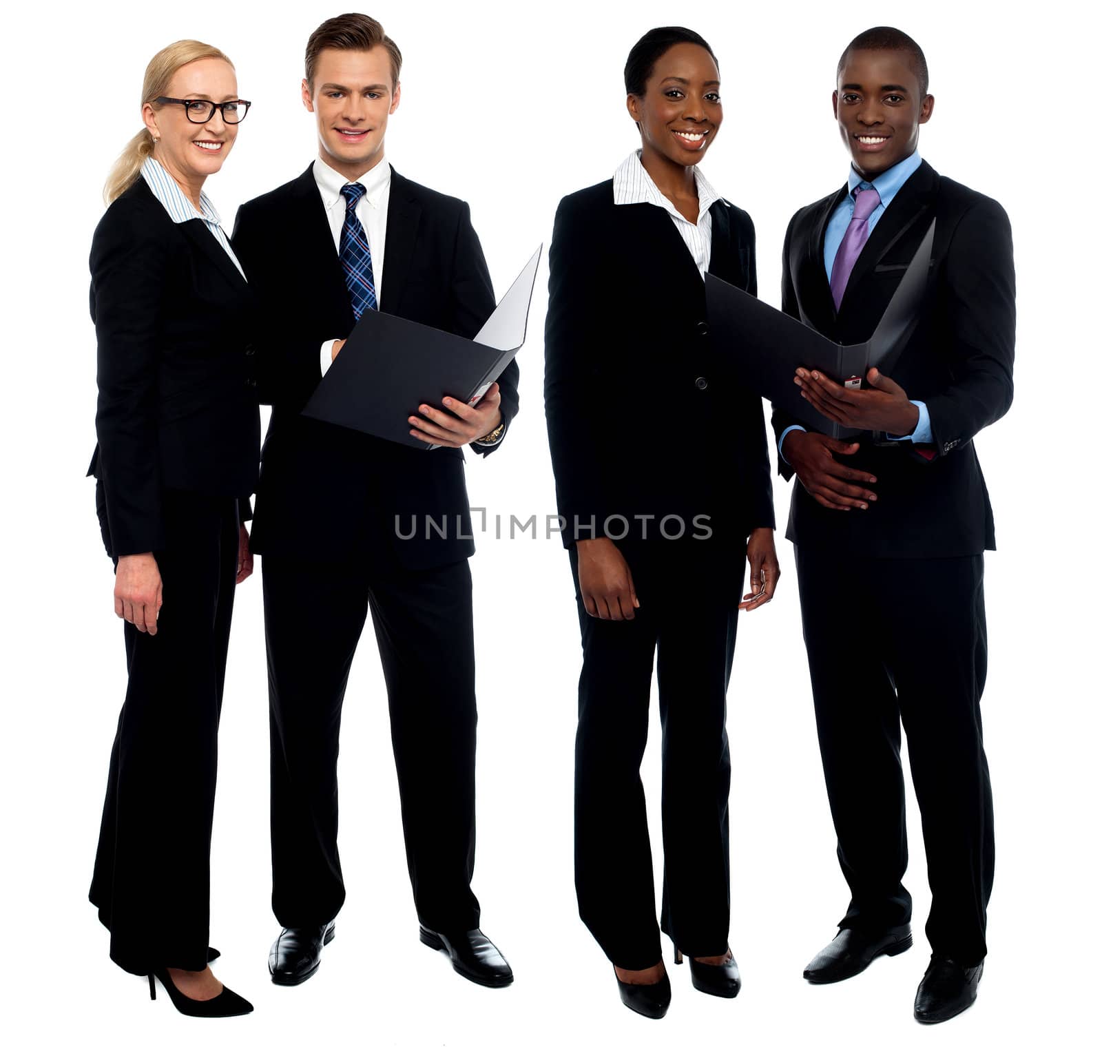 Successful business team discussing operations by stockyimages