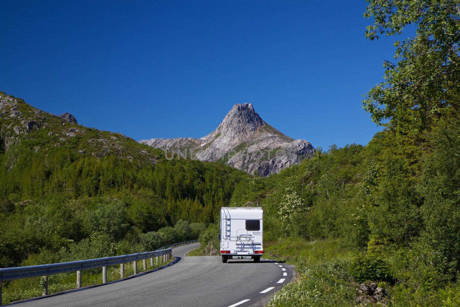 Camping car on roadtrip across Lofoten islands in Norway