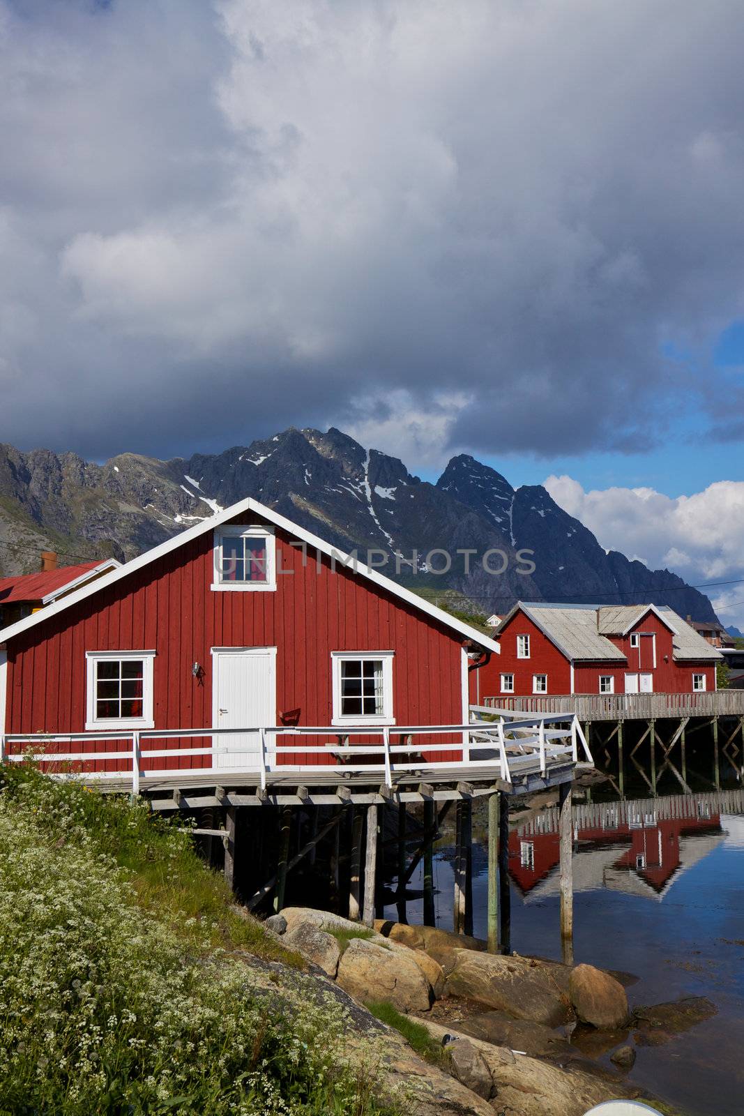 Red fishing huts in town of Henningsvaer on Lofoten islands in Norway