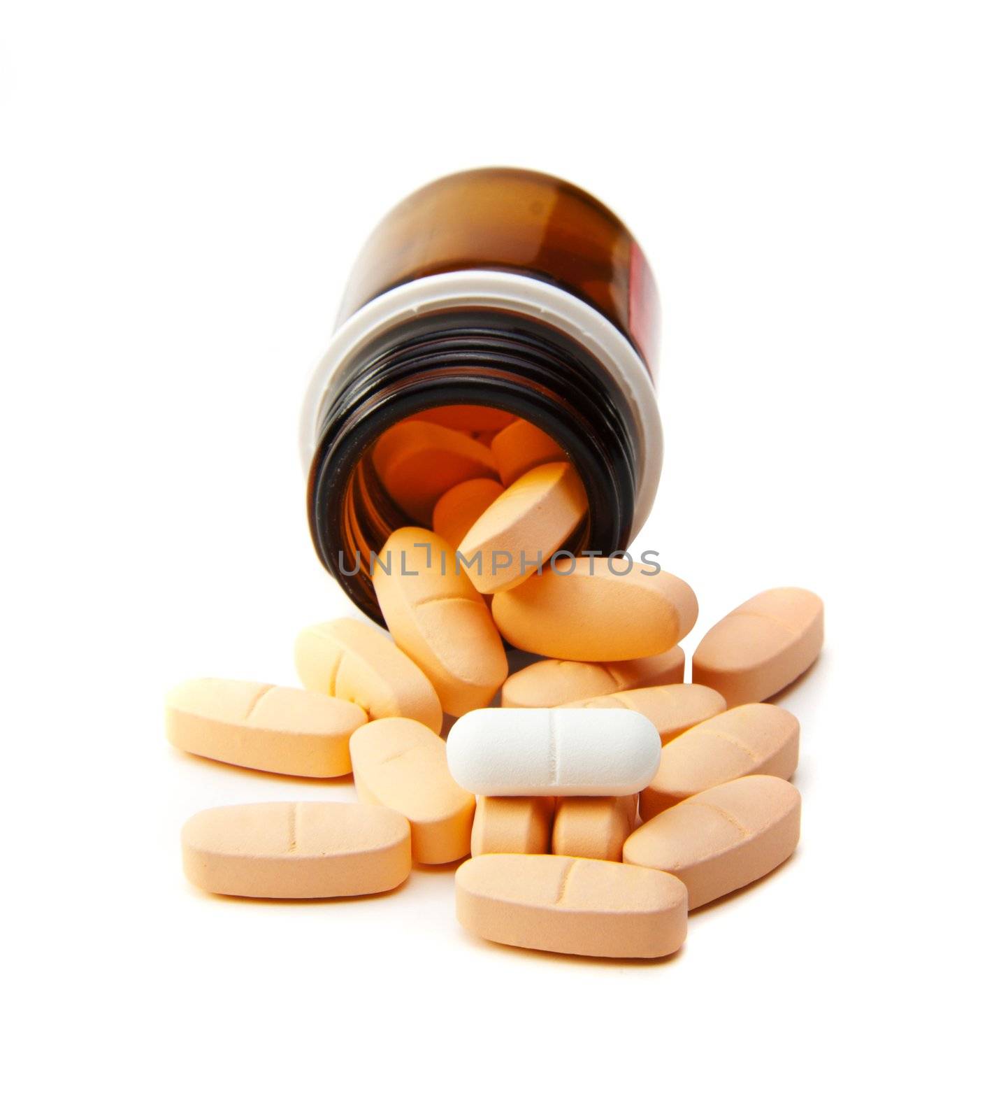 Overhead view of pills in plastic pot