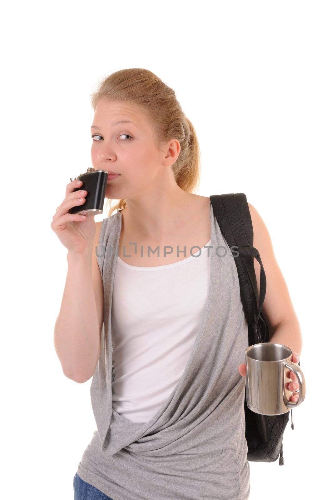 Beauty girl with metal cup and rucksack is testing smell of drink in a flask. Isolated on white background.