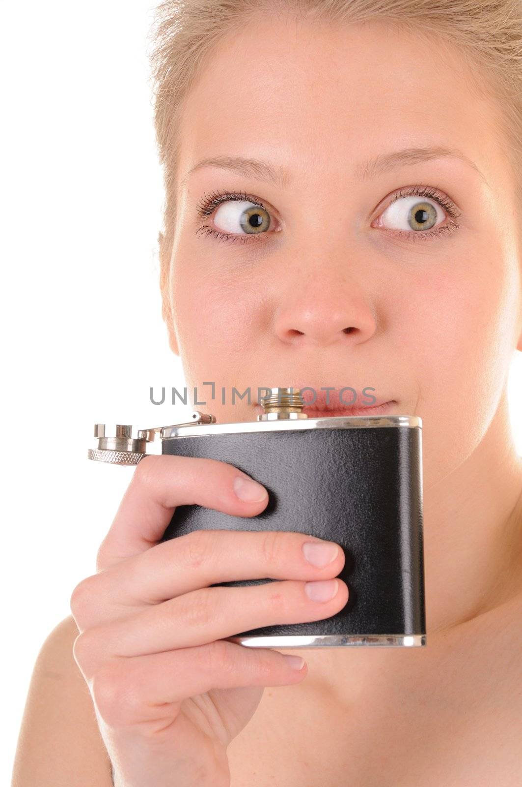Beauty girl is testing nice smell of drink in a flask
