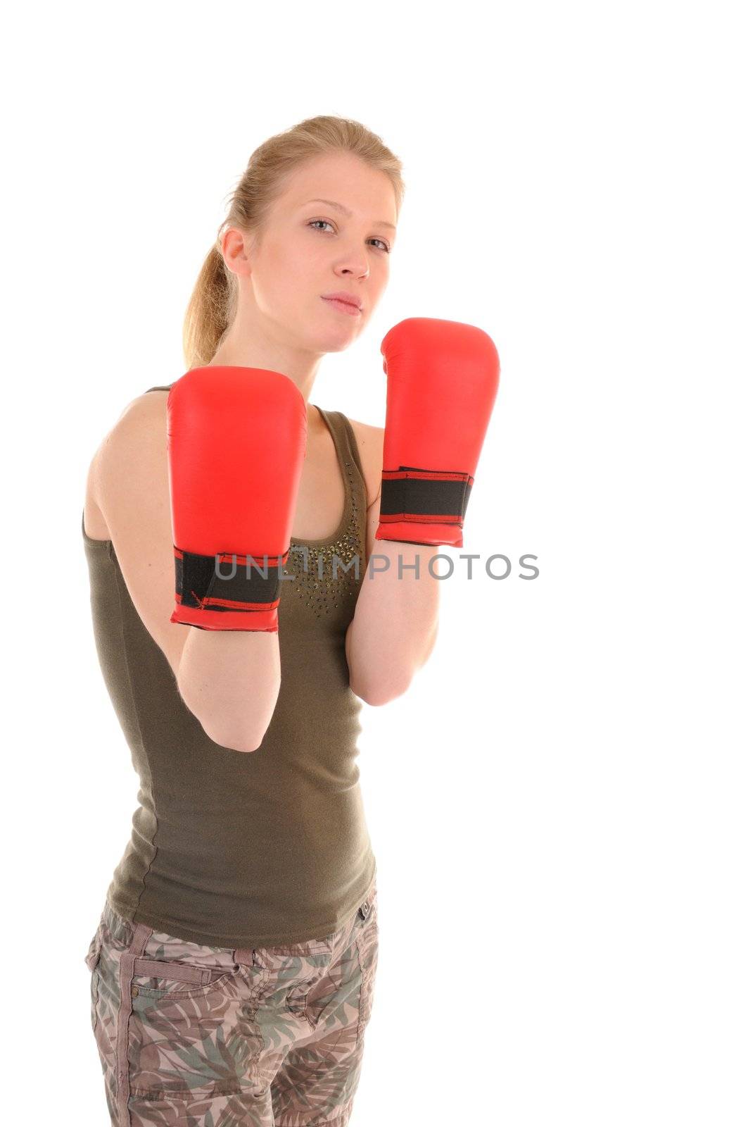 Girl is ready to fight with red boxing gloves