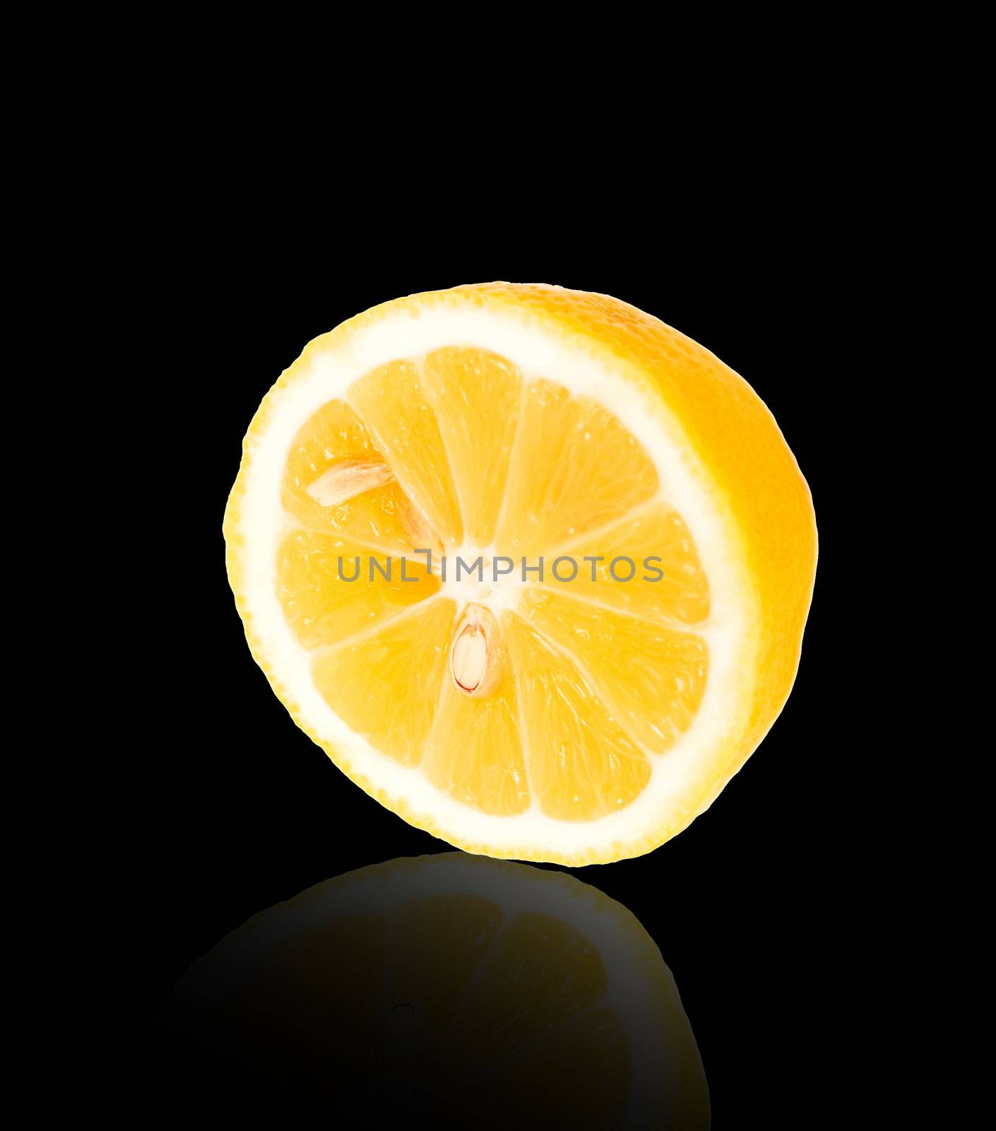 fresh yellow lemon insulated on black with cutting off the way