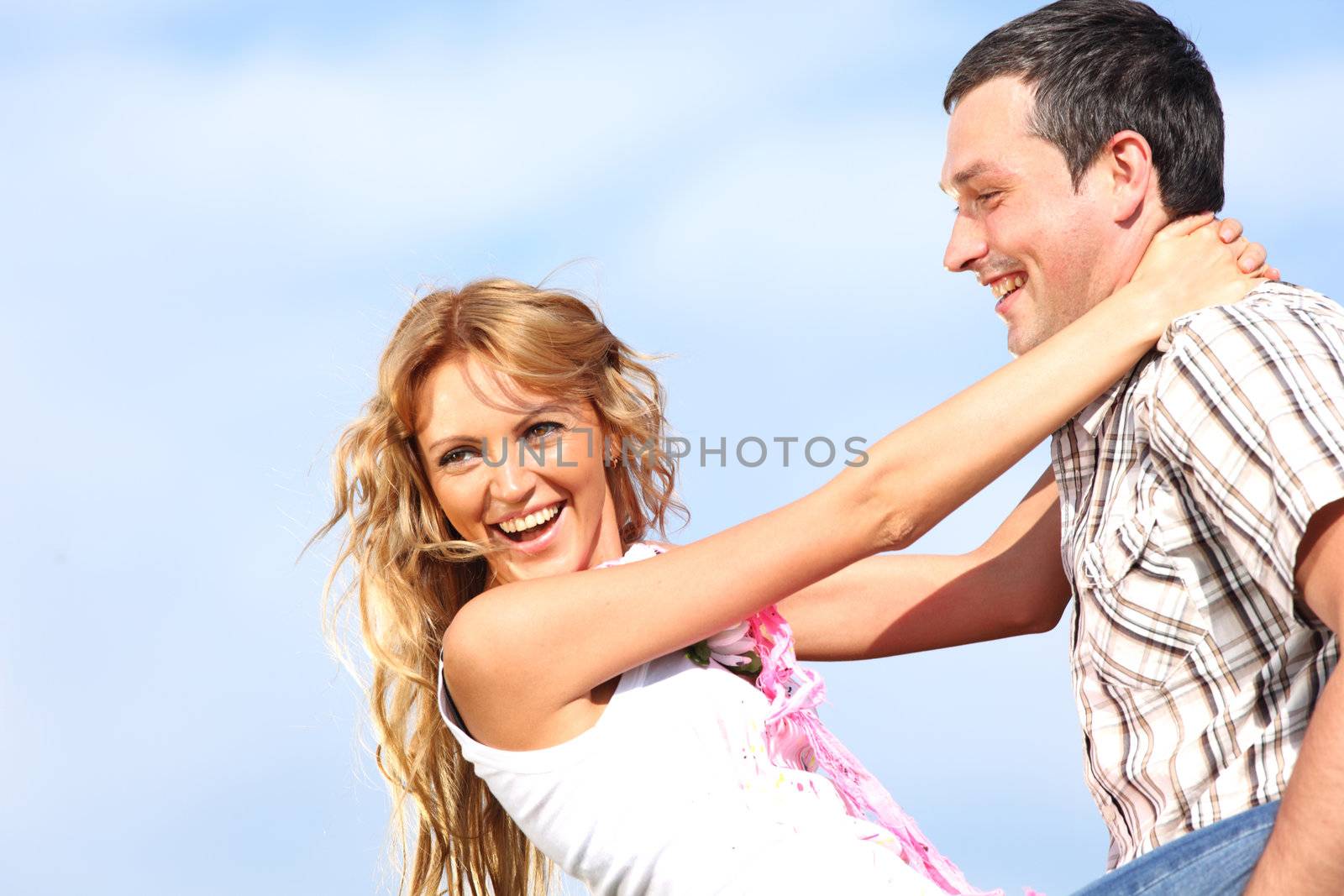 man and woman dance in the sky